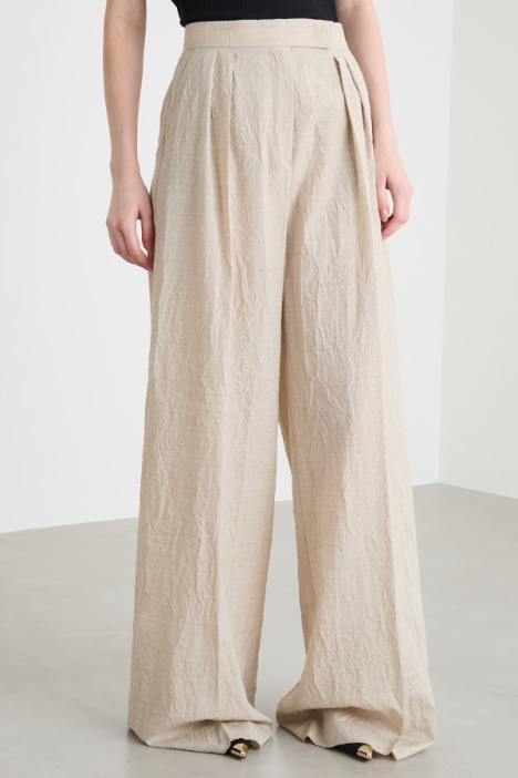 Pantalone palazzo con pieghe