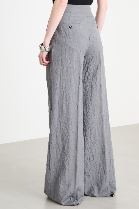 Pantalone palazzo con pieghe
