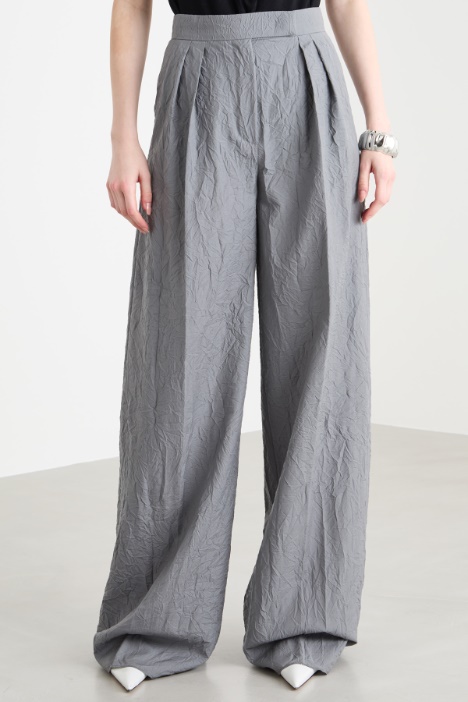 Pantalone palazzo con pieghe
