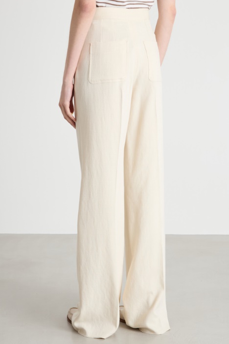 Pantalone con bottoni laterali