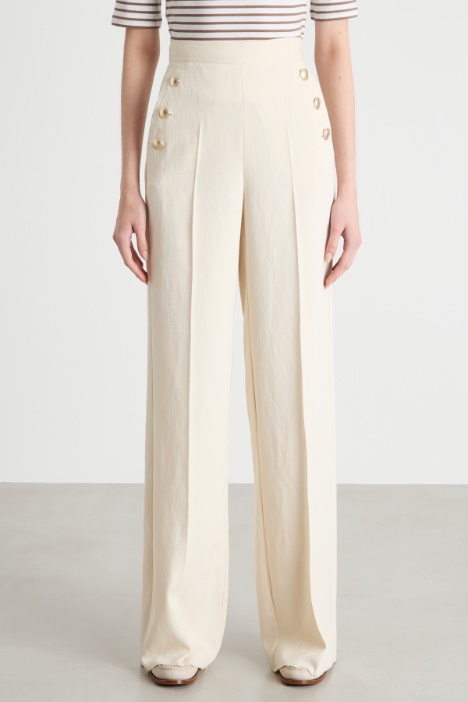 Pantalone con bottoni laterali