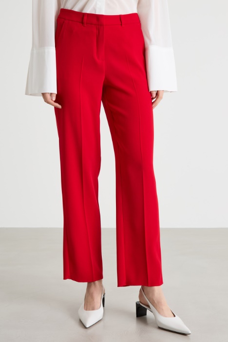 Pantalone con applicazione floreale