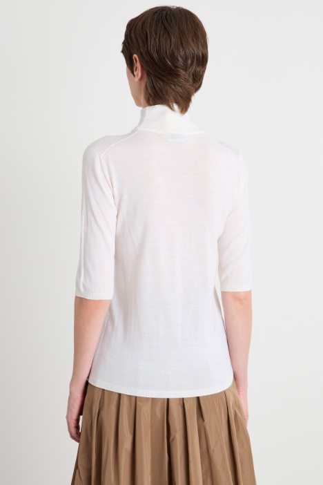 Maglia dolcevita con maniche tre quarti