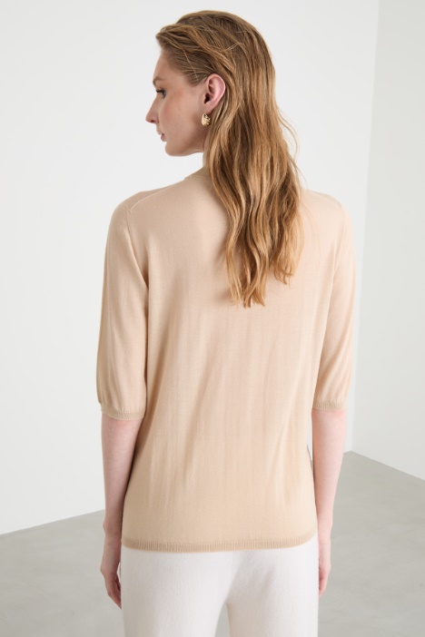 Maglia dolcevita con maniche tre quarti