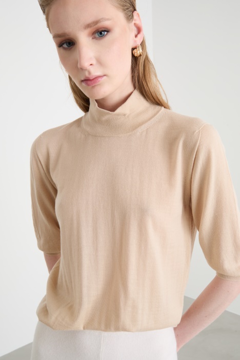 Maglia dolcevita con maniche tre quarti