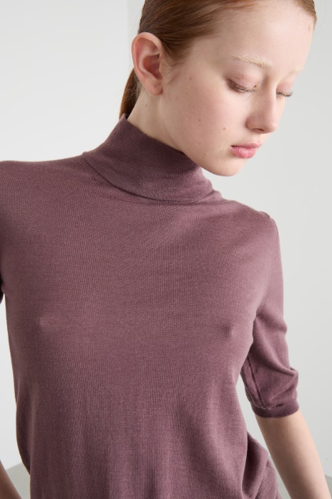 Maglia dolcevita con maniche tre quarti