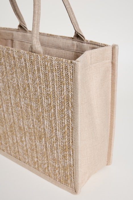 Borsa con motivi in rilievo