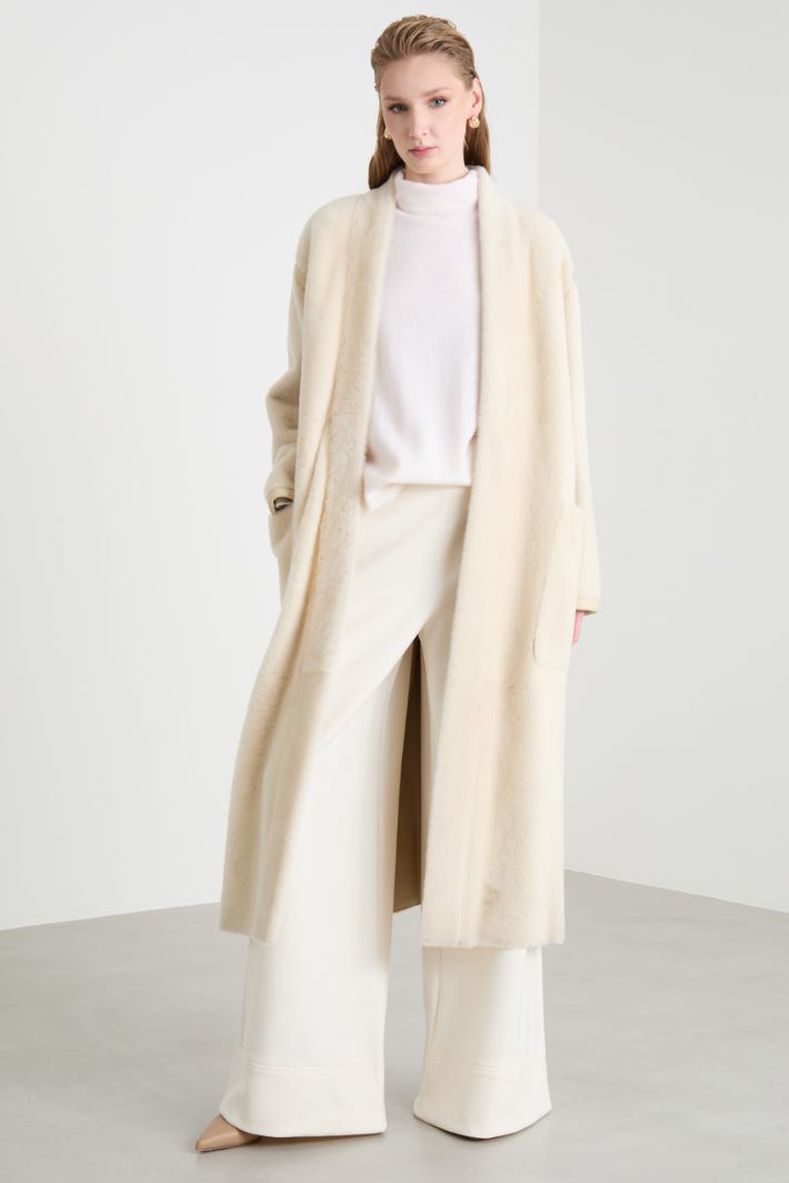 Flared trousers in technical jersey Intrend