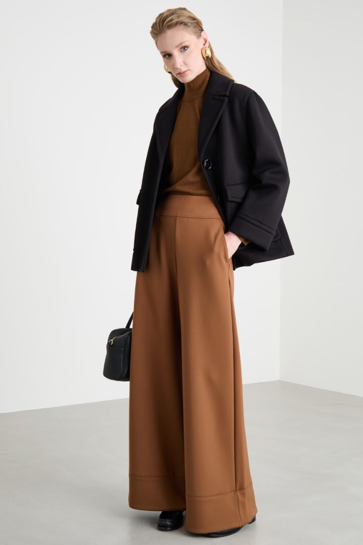 Flared trousers in technical jersey Intrend