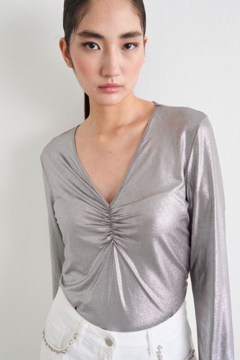 Top in jersey laminato