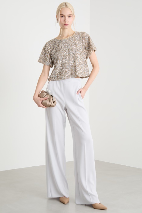 Top crop con paillettes Intrend