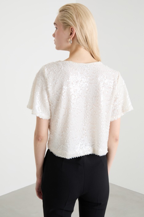 Top crop con paillettes