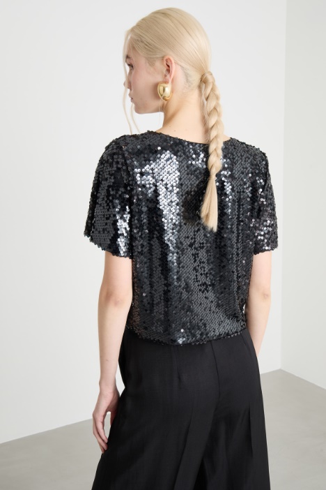Top crop con paillettes