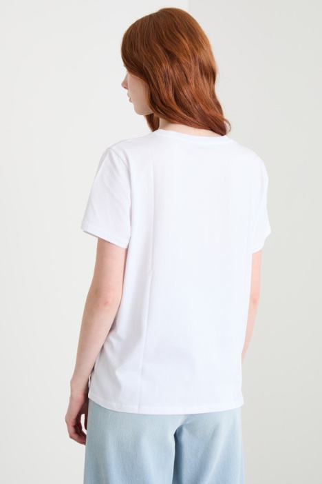 T-shirt con stampe e paillettes