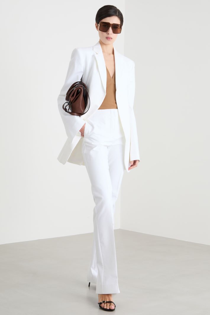 Pantalone aderente con spacco al fondo Intrend