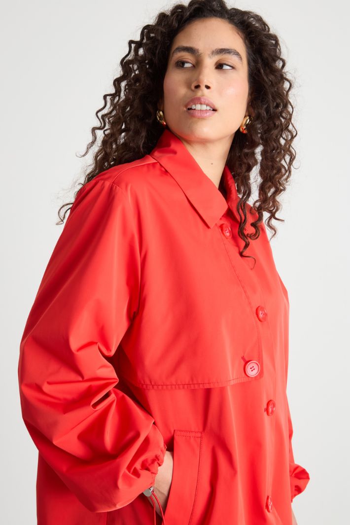 Short drawstring raincoat Intrend - 3