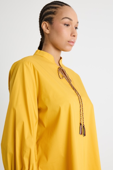 Blusa con nappe