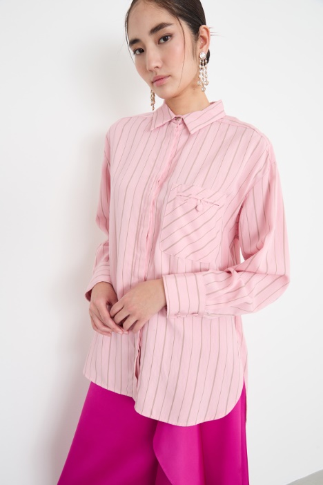 Blusa fluida con taschino