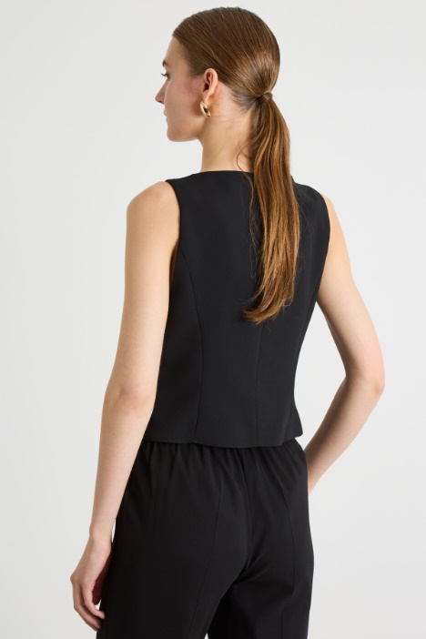 Gilet aderente con tasche