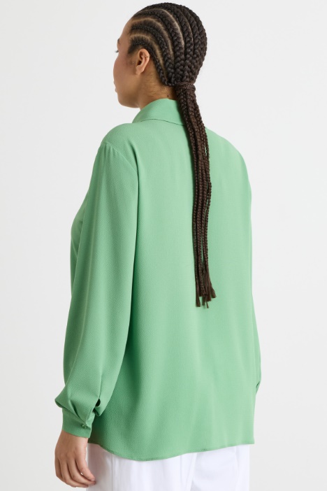 Camicia fluida con fondo arrotondato