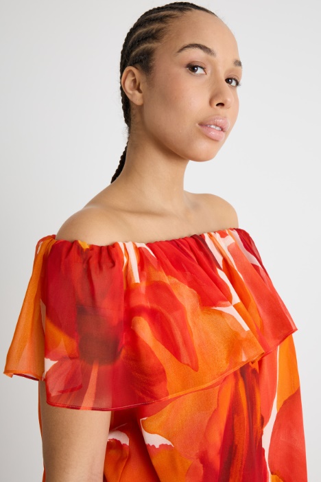 Blusa in georgette con balza