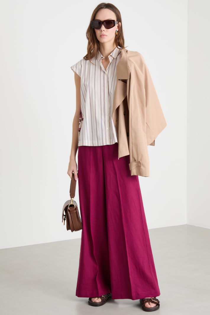 Pantalón palazzo con alamares Intrend