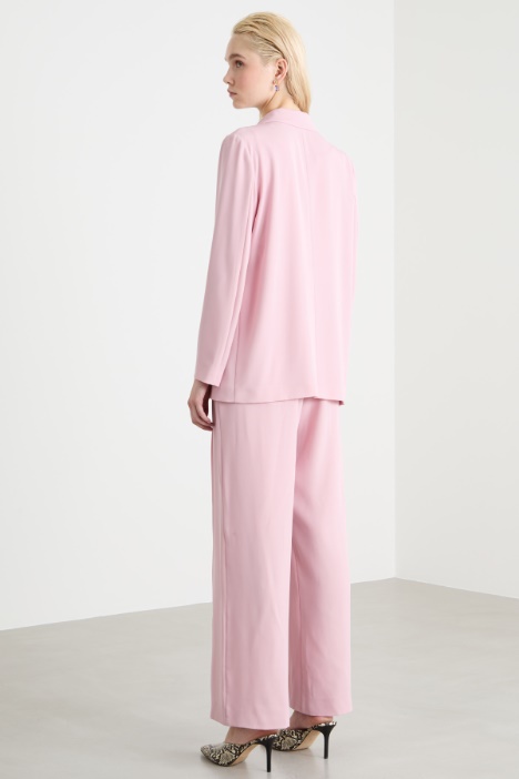 Conjunto fluido elástico