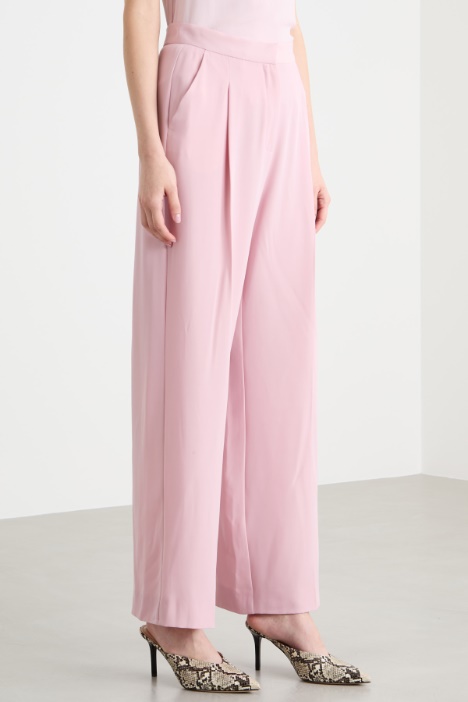 Conjunto fluido elástico