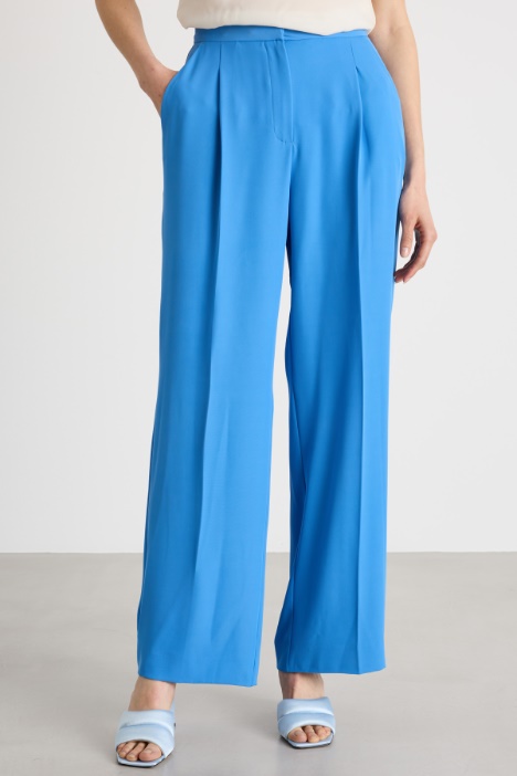 Conjunto fluido elástico