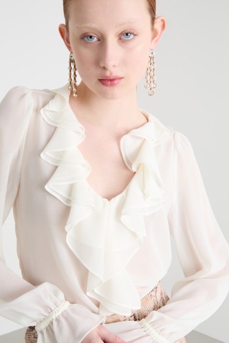 Blusa con volantes