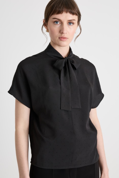 Blusa con micro cristalli