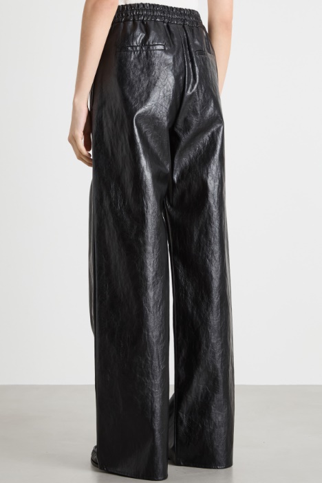 Pantalone palazzo in tessuto spalmato