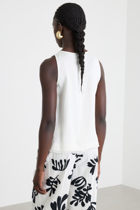 Top con orlo sfrangiato