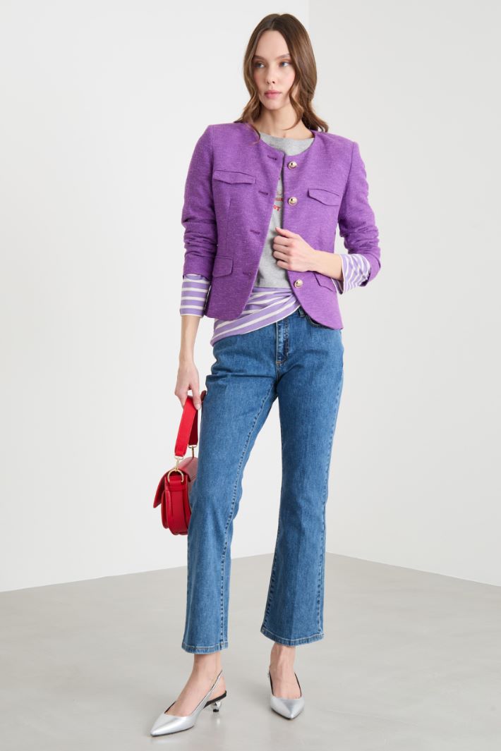 Jeans aderente con fondo flare Intrend