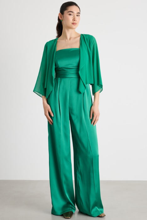 Tuta in raso tecnico con coprispalle