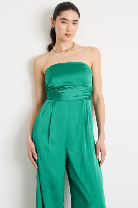 Tuta in raso tecnico con coprispalle