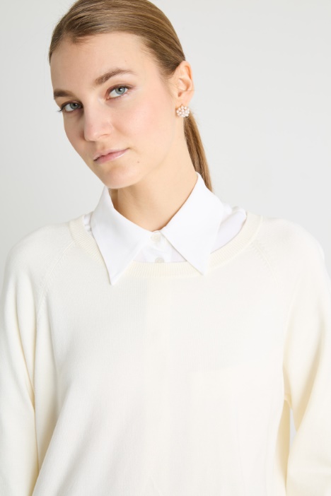 Maglia con fondo asimmetrico