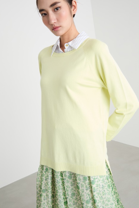 Maglia con fondo asimmetrico