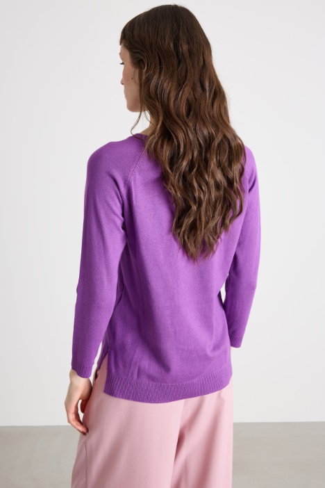 Maglia con fondo asimmetrico