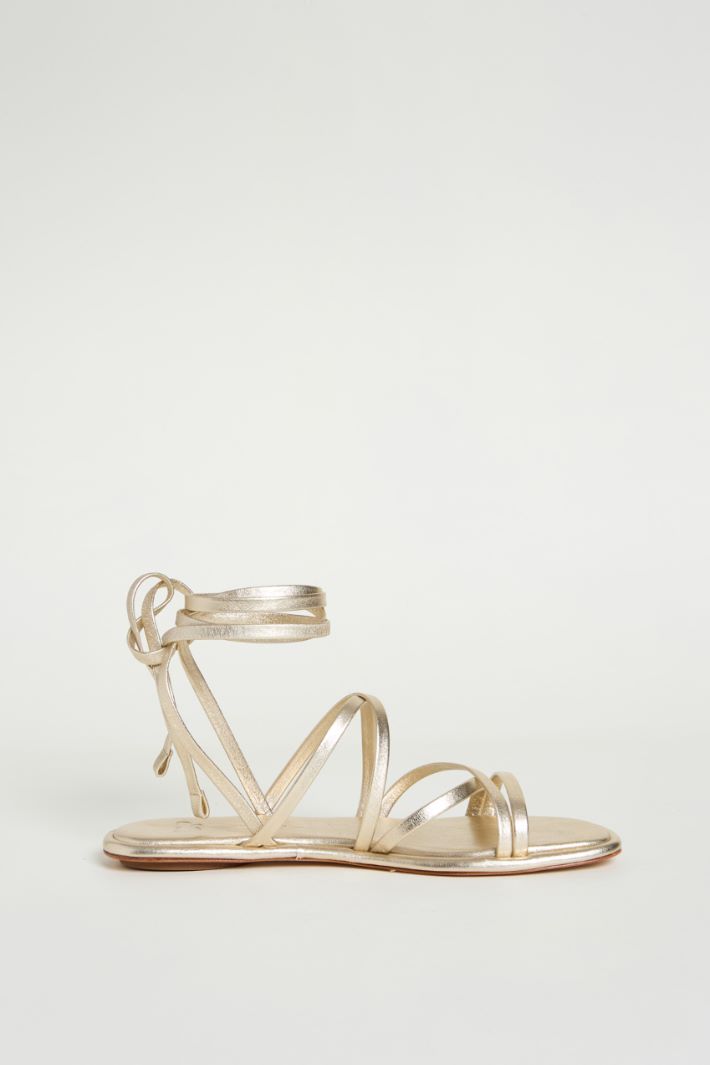 Laminated nappa leather flat sandals Intrend