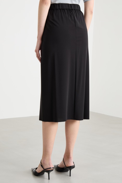 Gonna midi con drappeggiato asimmetrico