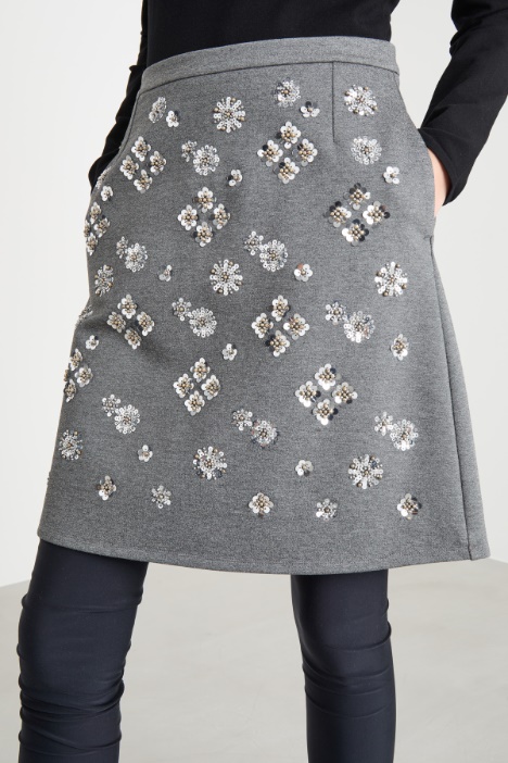 Minigonna in jersey con paillettes