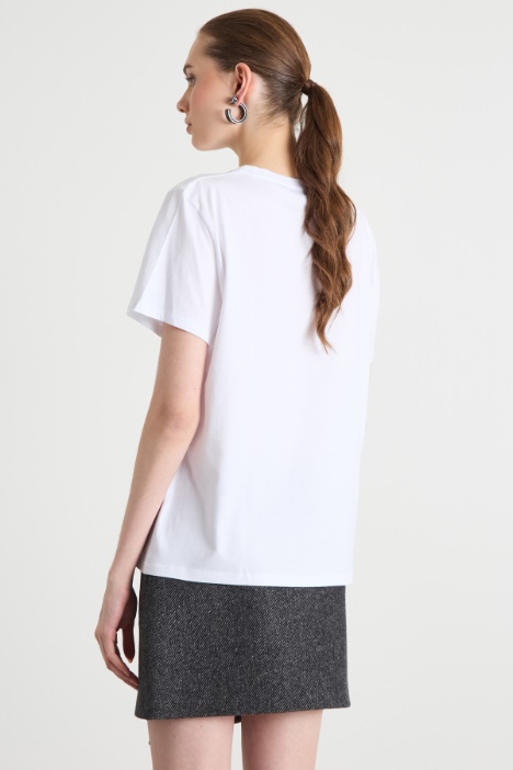 T-shirt con stampe e paillettes