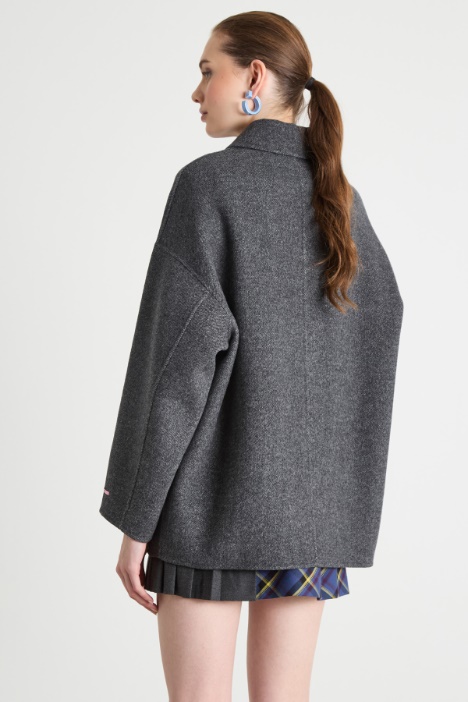 Chaqueta larga con bolsillos