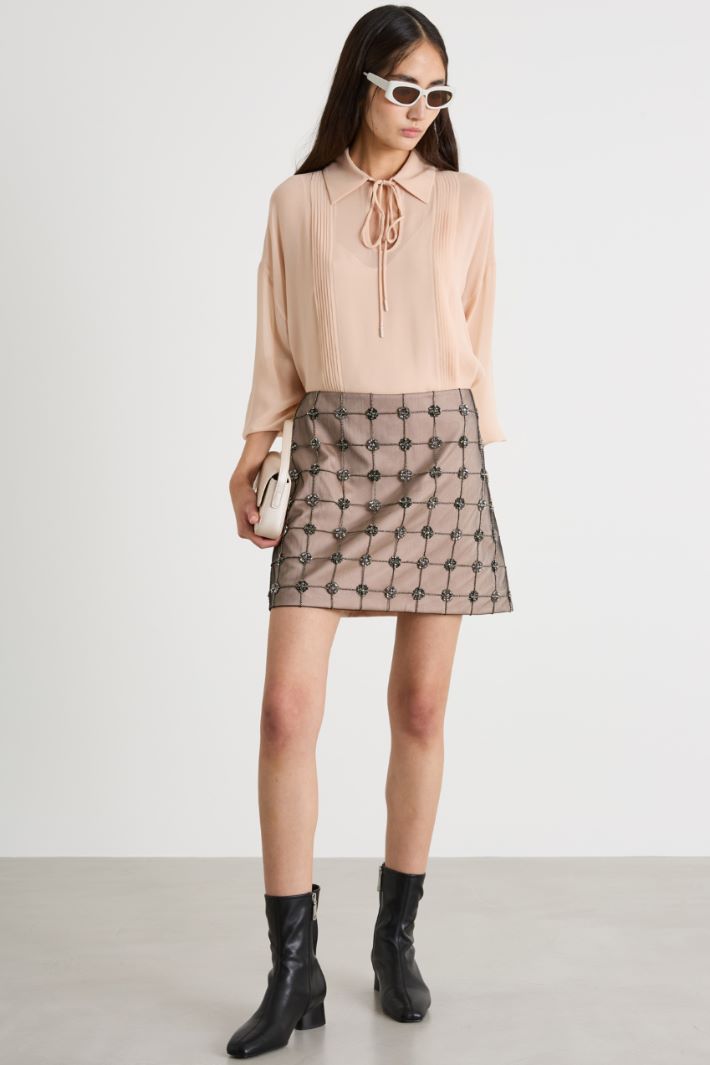 Minigonna in tulle ricamato Intrend