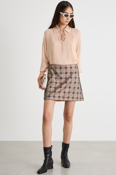 Minigonna in tulle ricamato Intrend