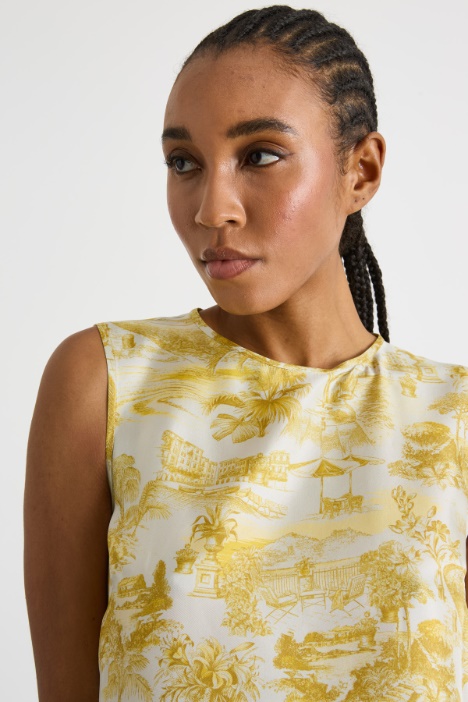 Blusa smanicata in twill stampato