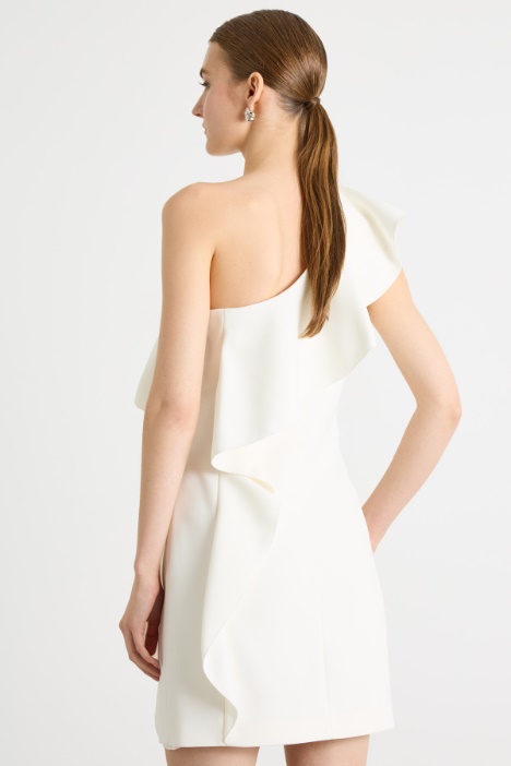 Abito monospalla con volant