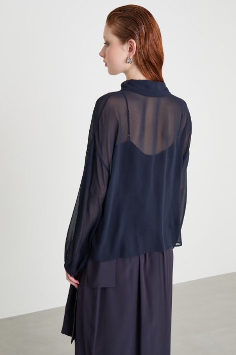 Blusa con maniche a sbuffo