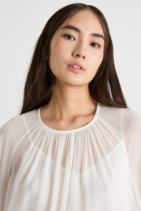 Blusa in georgette con maniche ampie